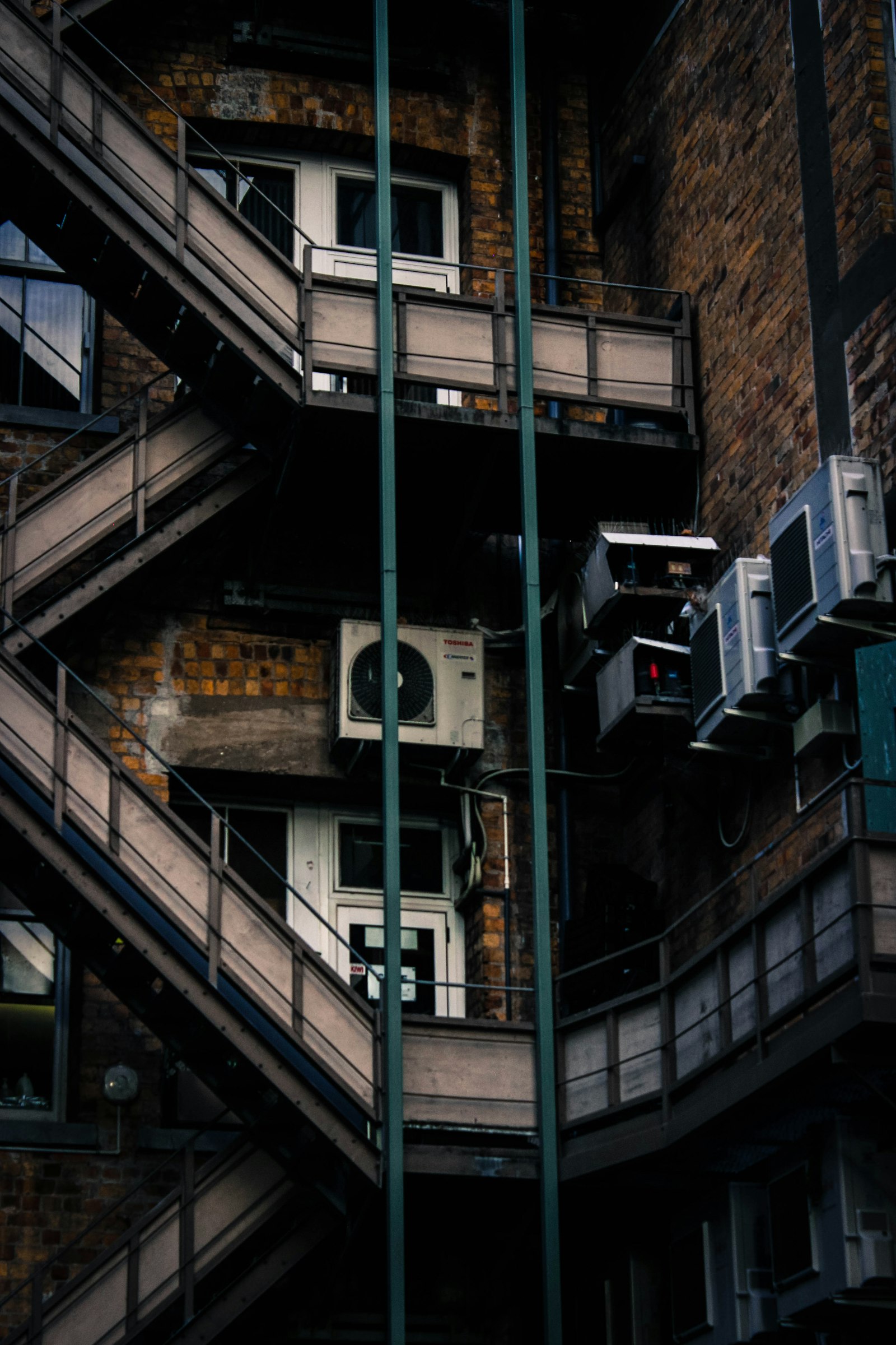 Apartment building with outdoor air conditioning condensers