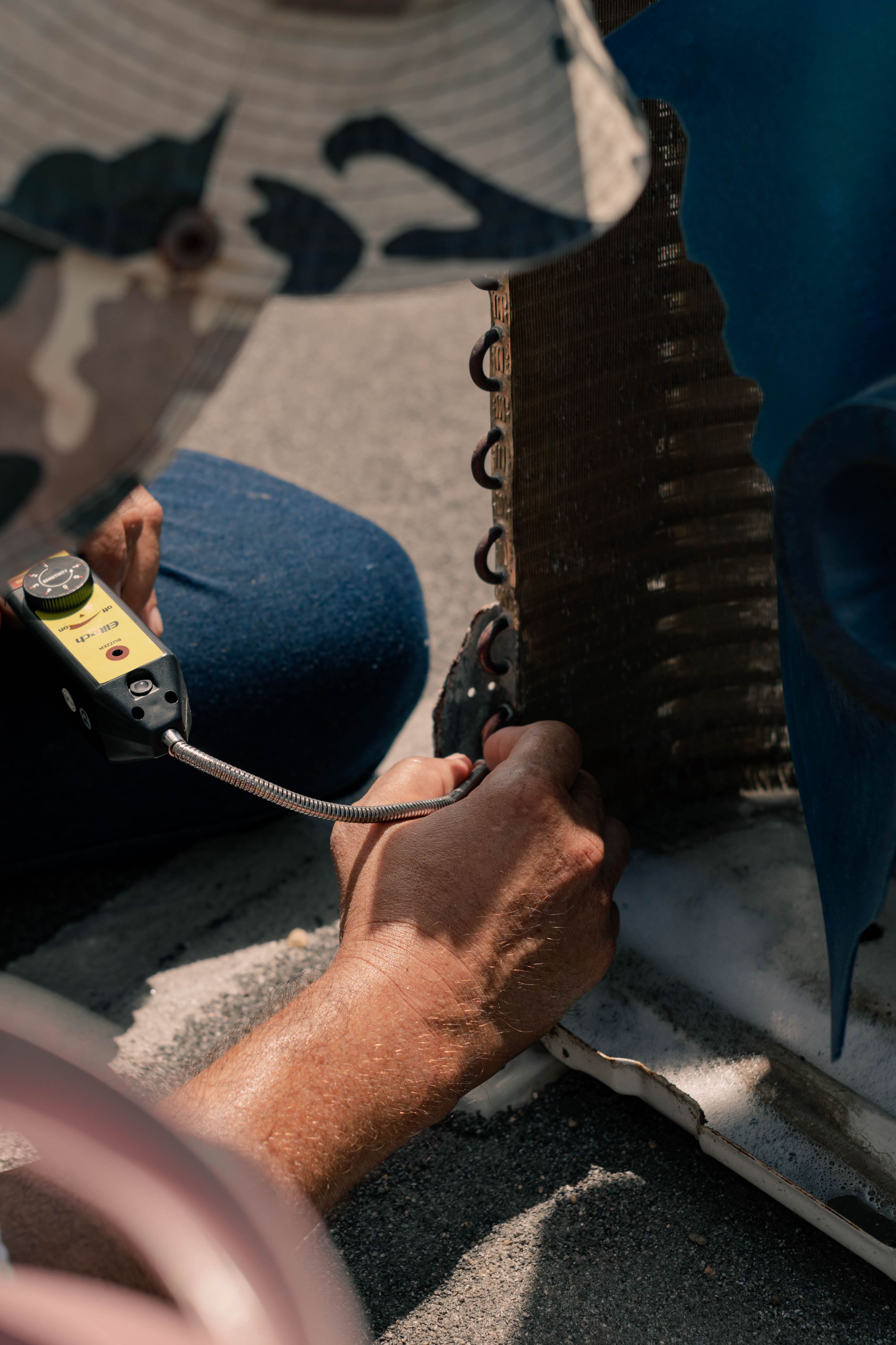 Close-up of air conditioner coil service and repair
